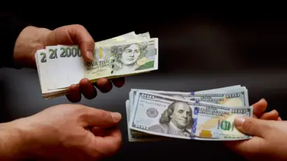 Co znamená slabší dolar pro výnosy korunových investorů?
